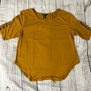 Blouse 3X stretchy with very cute sleeves, color is a fall mustard neutral